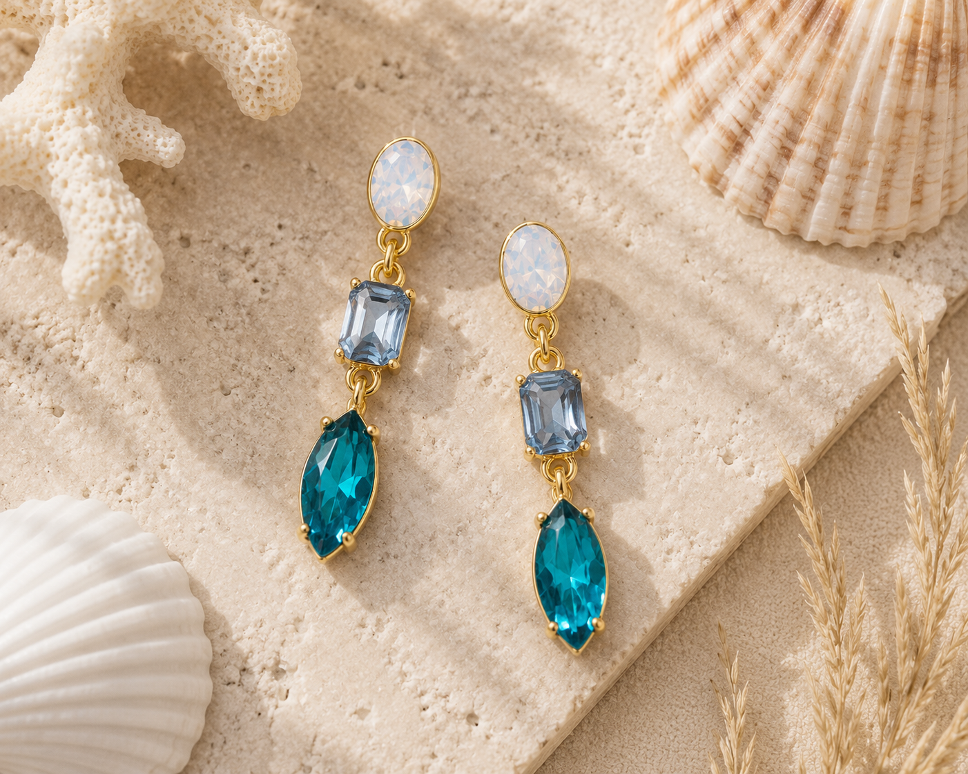Bluewater earrings styled in a coastal flat lay