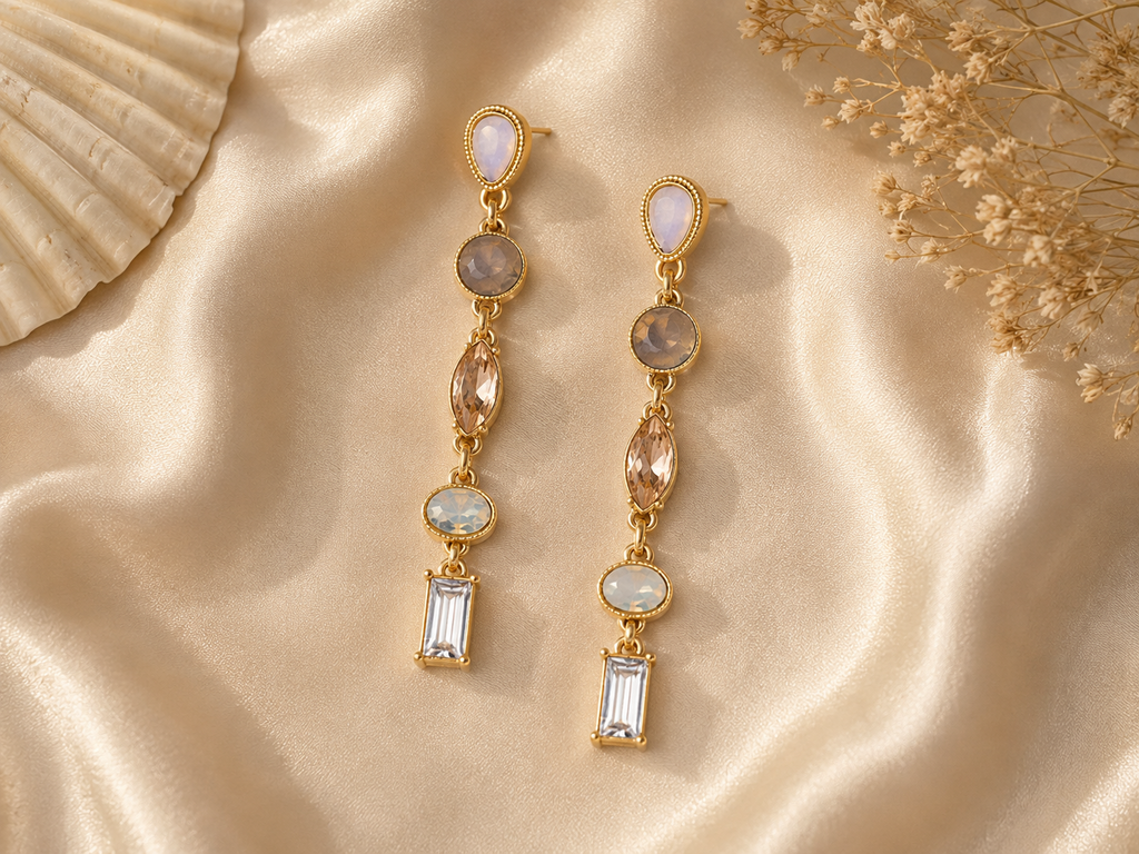 Seafoam Drop Earrings in a warm coastal flat lay